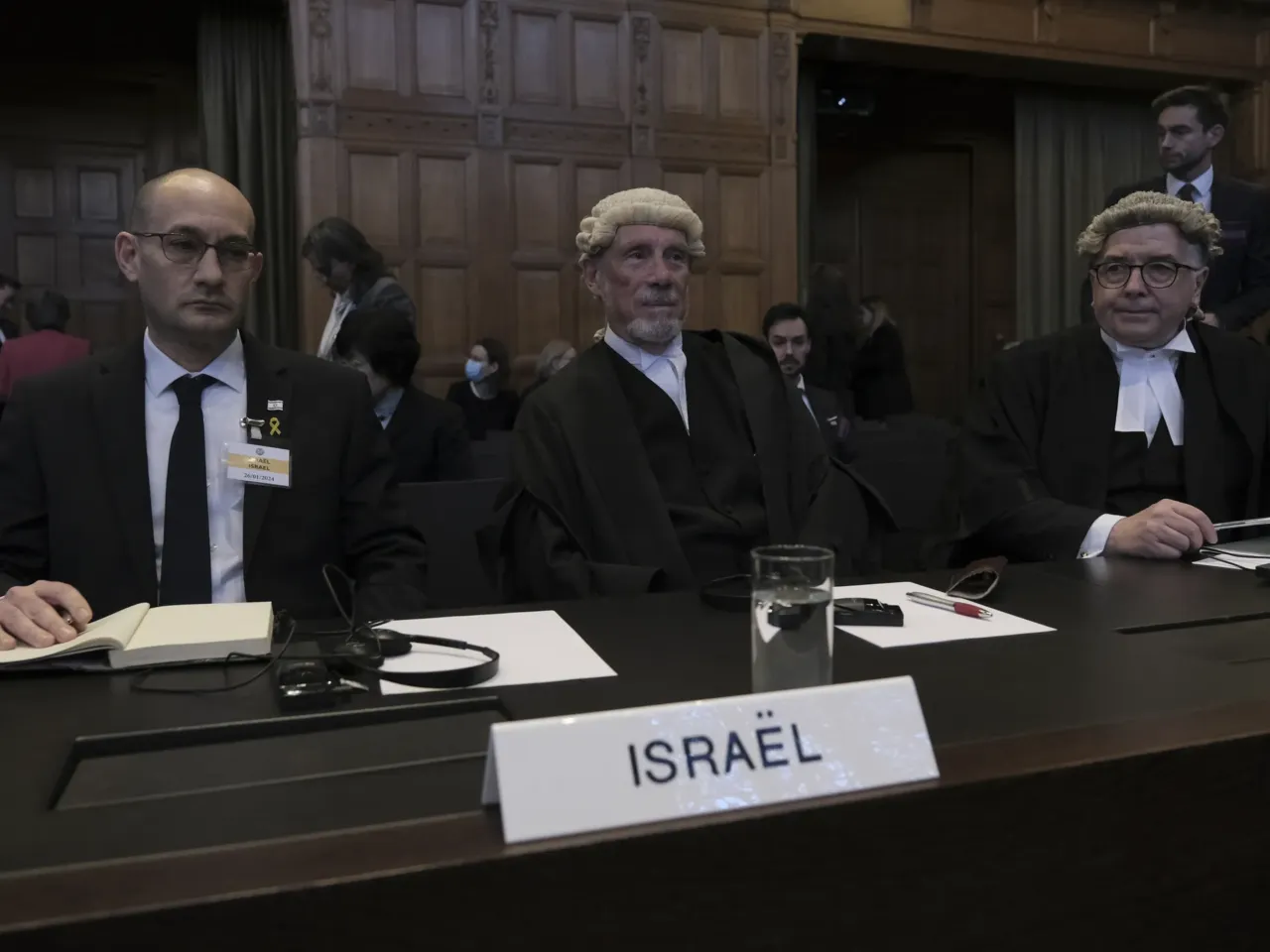 A question of intent: Is what's happening in Gaza genocide? 2 British jurist Malcolm Shaw (center) and Gilad Noam (left), Israel's deputy attorney general for international affairs, attend a session of the International Court of Justice in The Hague, Netherlands, on Jan. 26, 2024.