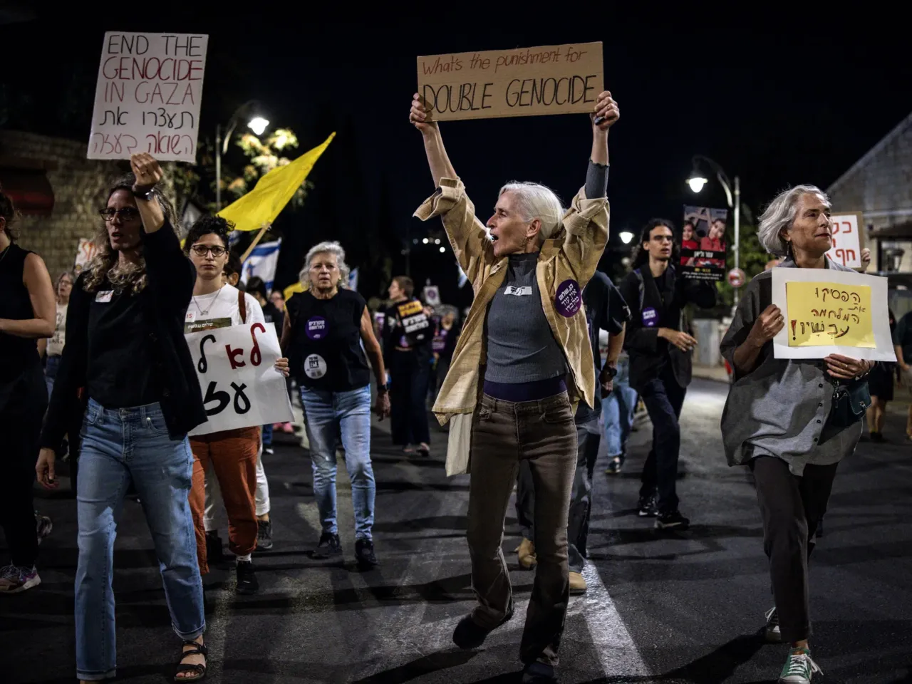 A question of intent: Is what's happening in Gaza genocide? 4 Protesters in Jerusalem on Sept. 20 hold placards during a demonstration against the war in Gaza and calling for the release of hostages.
