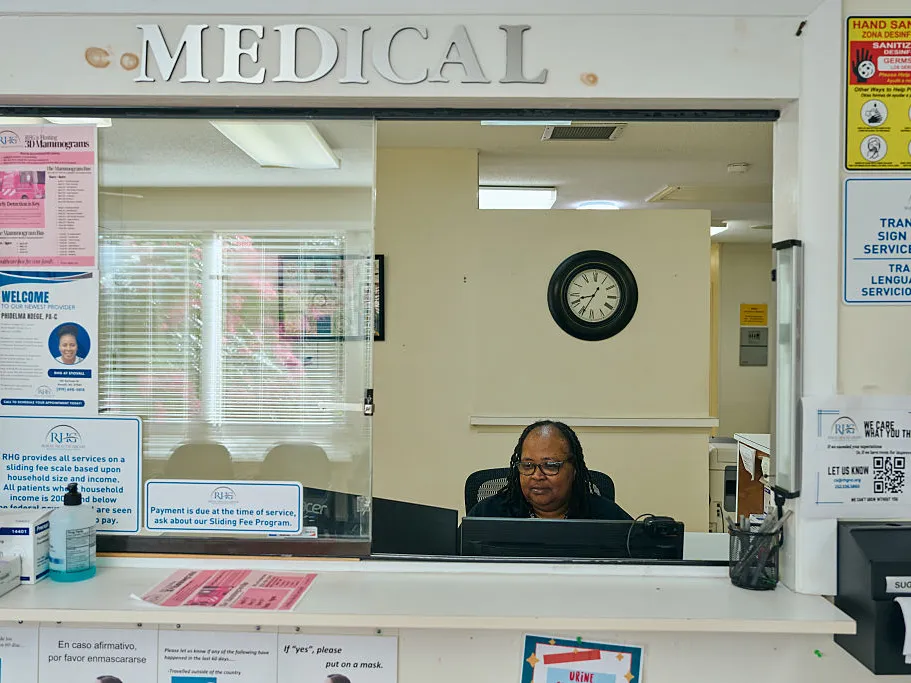 Patient Account Specialist Yolanda Baskerville works at the Rural Health Group clinic in Stovall, N.C. in July. Medical debt affects 100 million Americans.