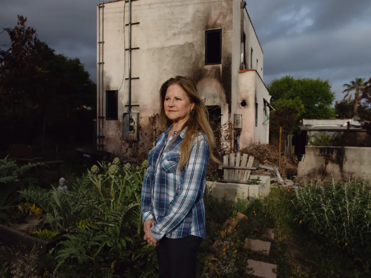 Hours before the Eaton fire, distribution lines failed and fire started in Altadena 2 Lea Chazin stands in front of her home in Altadena, which was damaged by the Eaton Fire.
