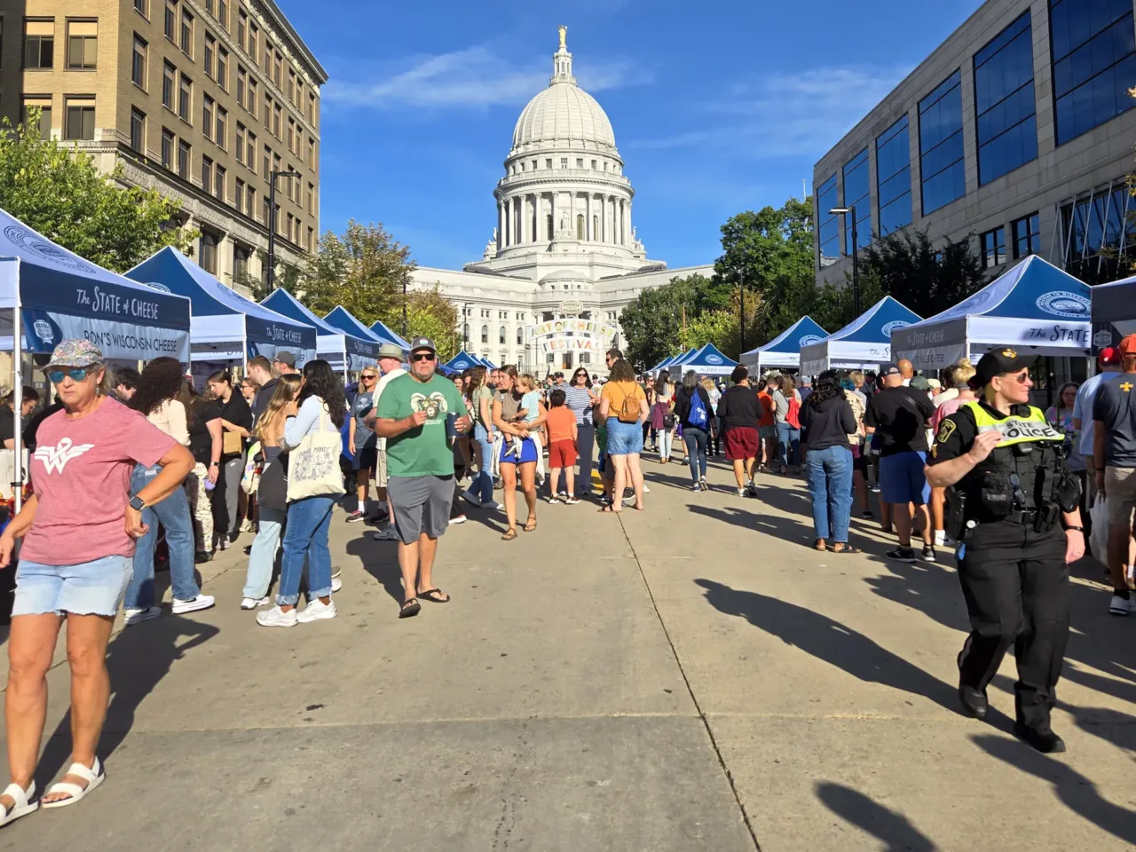 How to do a Wisconsin cheese festival right 2 Fairgoers looking for just the right taste get a chance to explore a vast array of cheeses and chat with cheesemakers displaying their wares at one of the Festival's outdoor events.