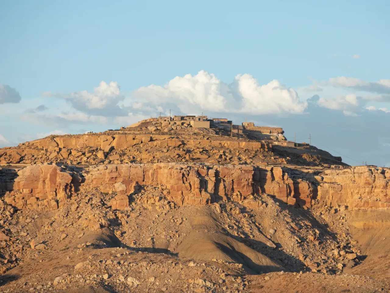 A tribe in Arizona planned to connect 600 homes to electricity. Then the funding was cut 3 On Aug. 7, the Environmental Protection Agency sent termination letters to all Solar for All grant awardees, including the Hopi Tribe, which had been approved for $25 million from the program. That money would have connected around 600 homes to solar power and battery-powered electricity. Here, a village on the Hopi Reservation is seen atop a mesa.