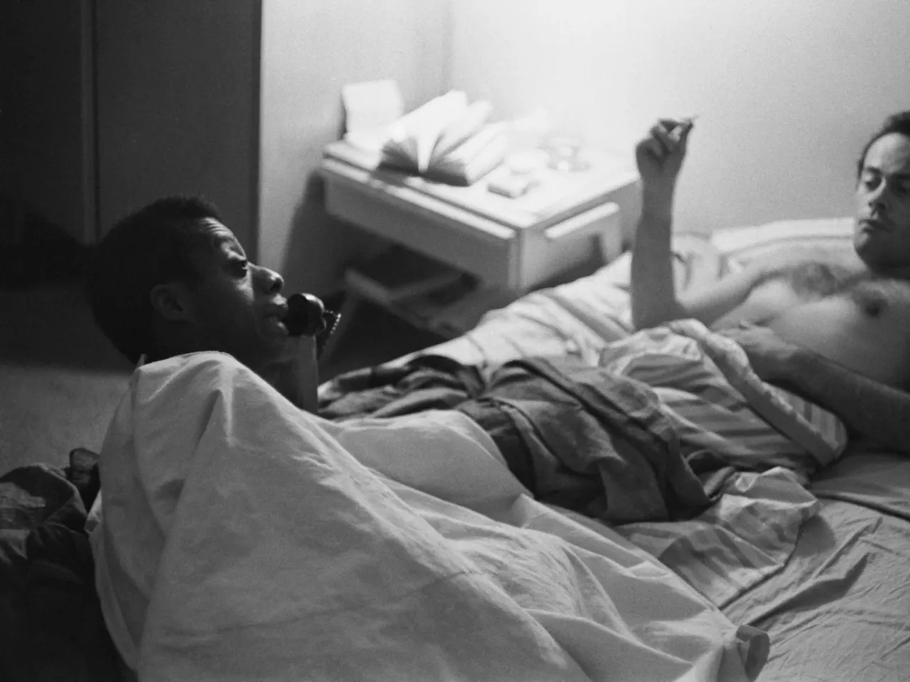 A new James Baldwin biography explores how his lovers influenced his work 3 James Baldwin in bed with his Lucien Happersberger in 1963. The two were on and off again for years but Happersberger was there when Baldwin died.