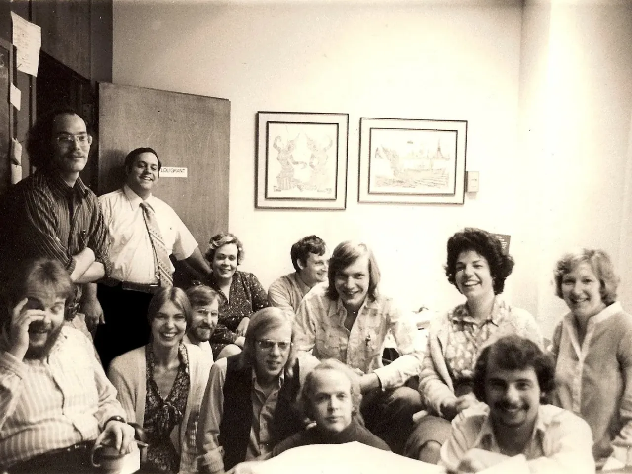 Susan Stamberg (back second from right) sits with the All Things Considered team.