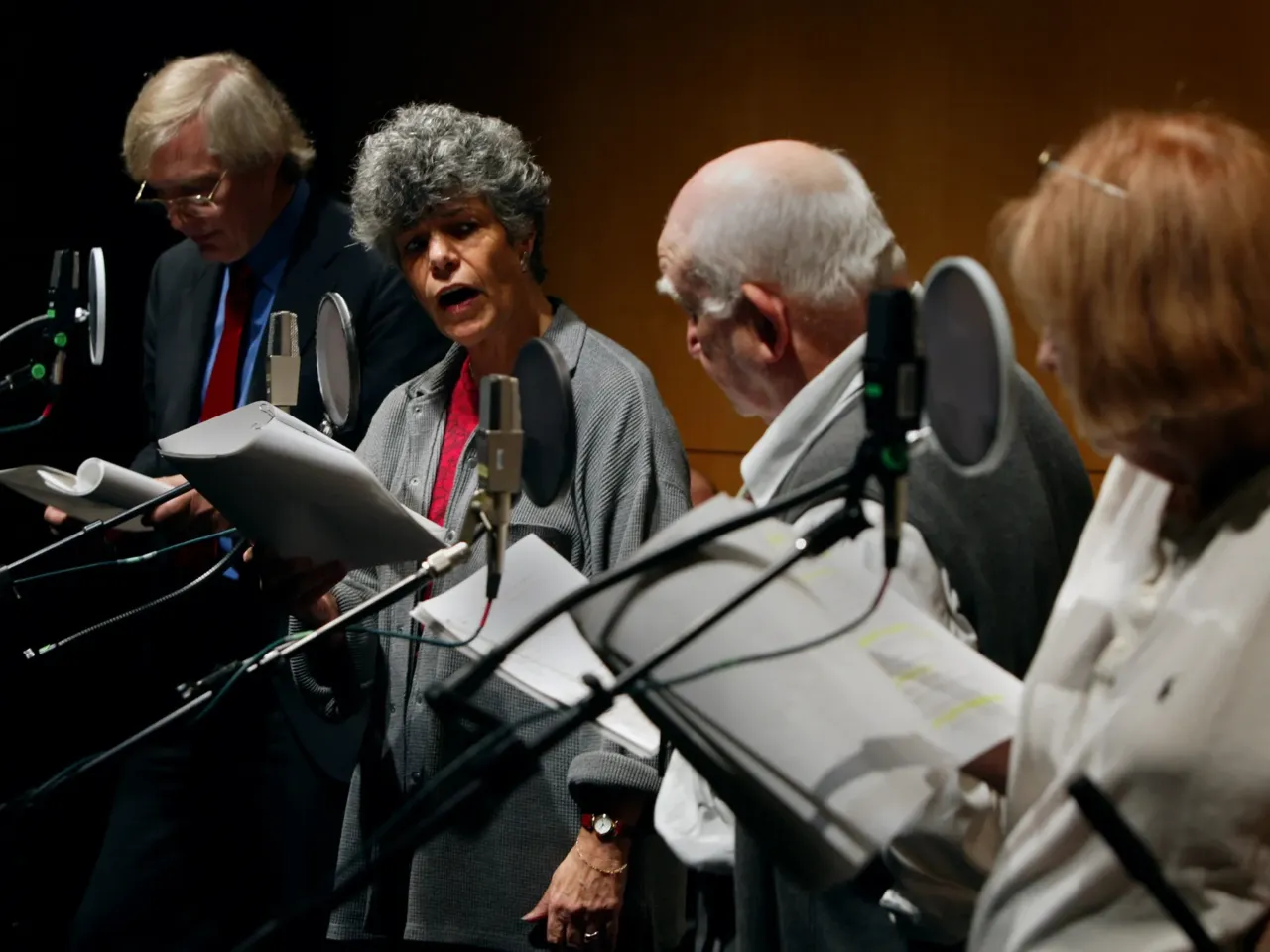 NPR's Susan Stamberg (second from left) and Bob Edwards rehearse their parts in a radio drama with actors Ed Asner and Anne Meara. The radio play, "I'd Rather Eat Pants," was broadcast on NPR in 2002.