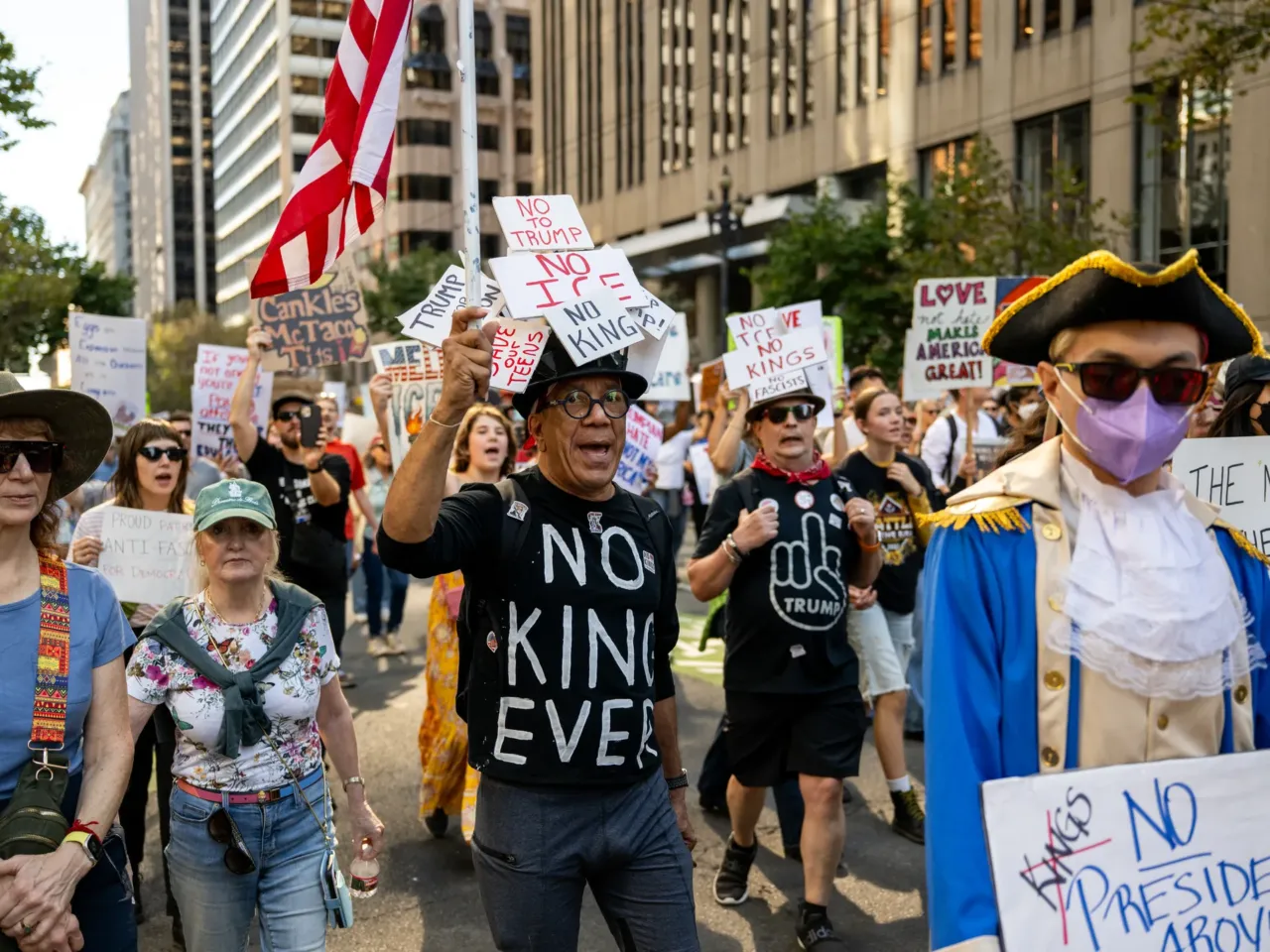 Demonstrators march during a No Kings protest in San Francisco, Calif., on Oct. 18, 2025.