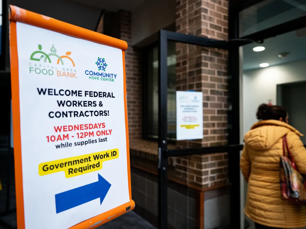 A furloughed federal worker arrives to pick up boxes of food items at a Capital Area Food Bank distribution site in Gaithersburg, Md. on Oct. 29.