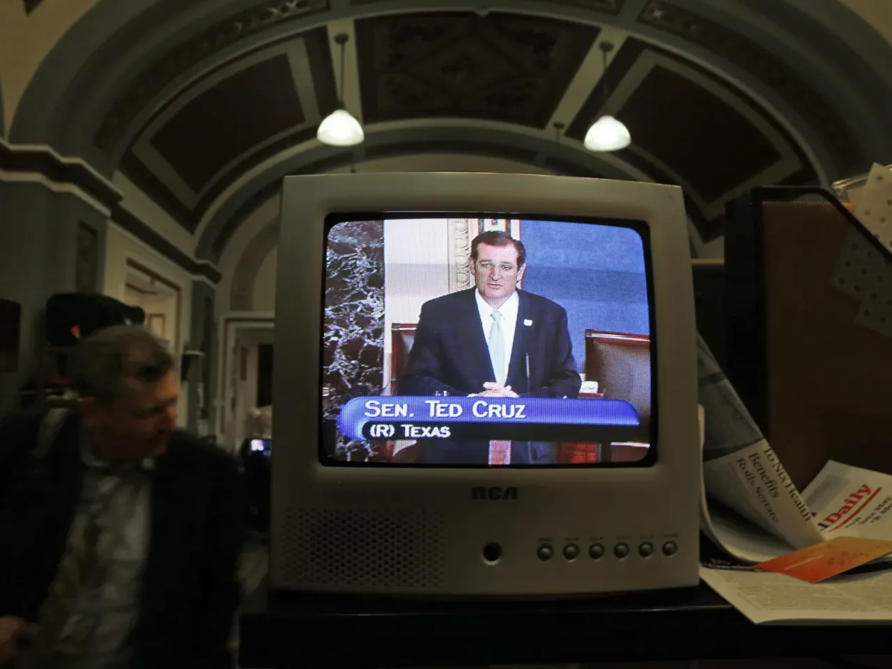 Sen. Ted Cruz, R-Texas, is seen on a television in the Senate Press Gallery as he speaks during a filibuster on the Senate floor on Sept. 24, 2013. Cruz held the Senate floor for more than 21 hours, railing against Obamacare and memorably reading from Dr. Seuss' "Green Eggs and Ham."