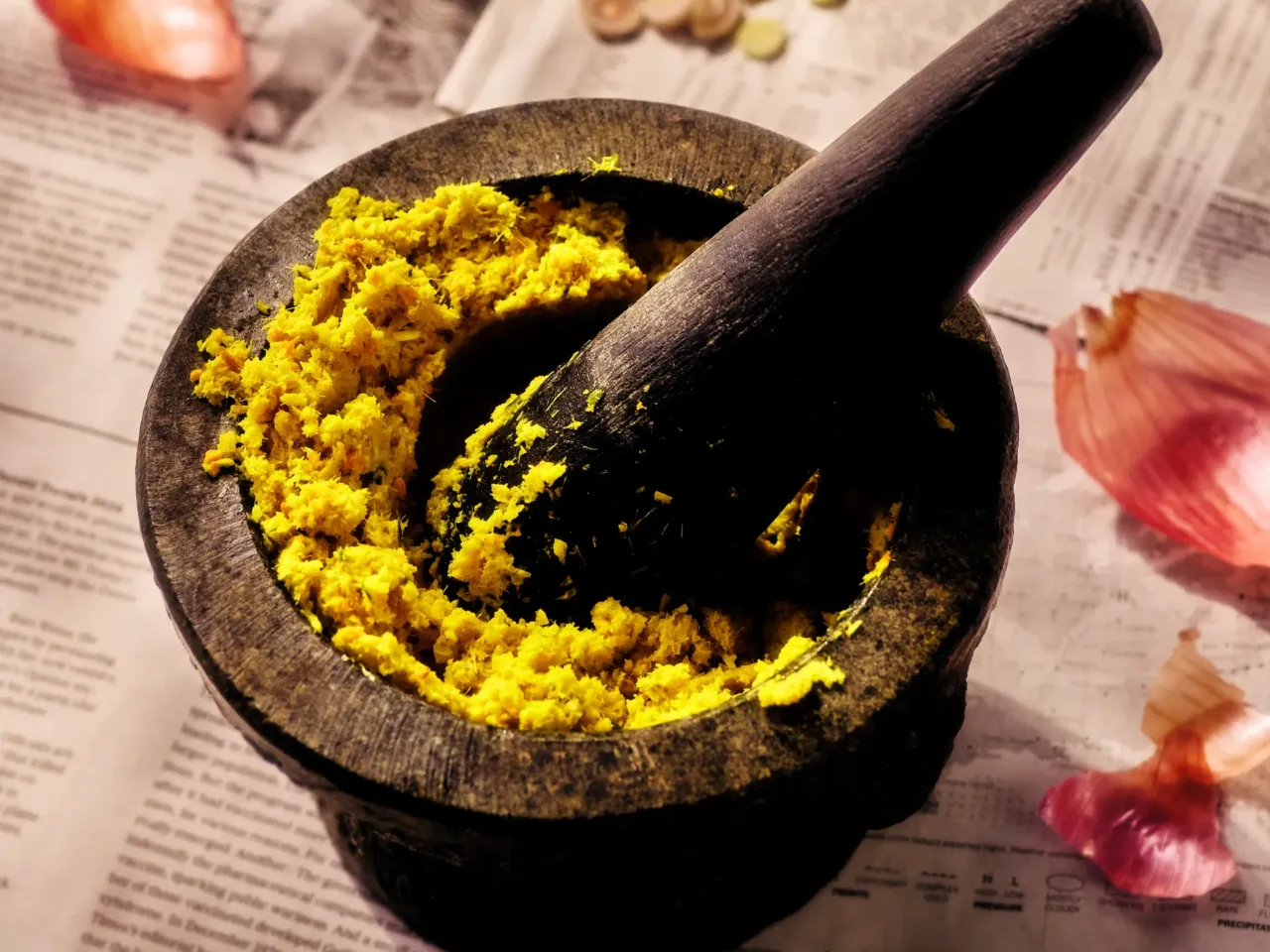 Kroeung its a paste made from turmeric, lime leaves, shallots and galangal. It is considered to be the foundation of Khmer cuisine.