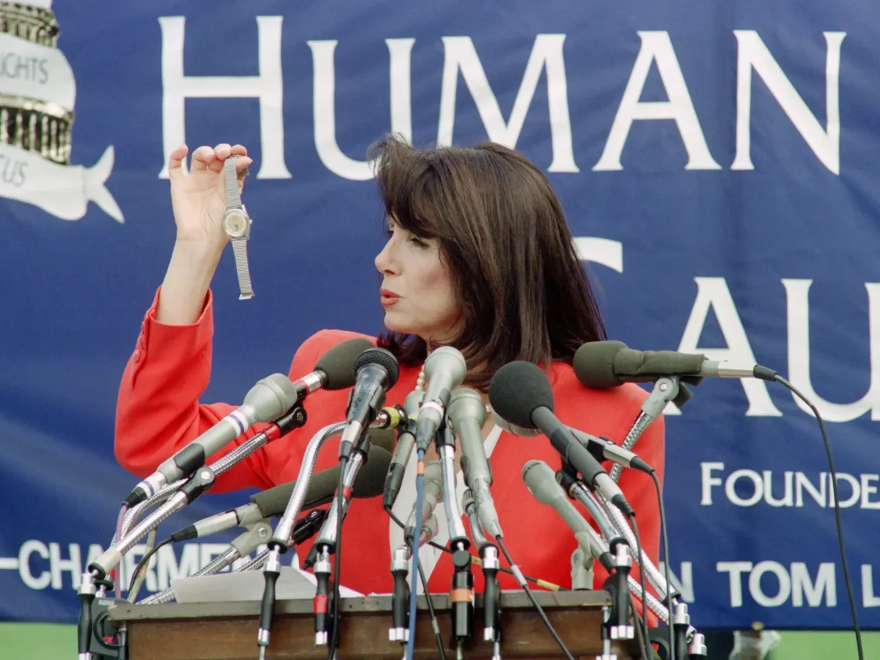 Rep. California Nancy Pelosi holds a watch on June 4, 1991 reportedly smuggled out of China. - Pelosi said the watches were given to soldiers who helped crush the Tiananmen Square protesters.