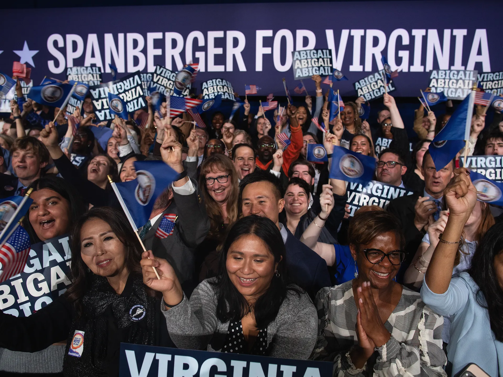 Photo essay: Amid historic election, Virginians long for change 31 Supporters of Democratic Gov.-elect Abigail Spanberger celebrate her victory as she takes the stage. Spanberger, a former congresswoman for Virginia's 7th Congressional District, defeated Republican Lt. Gov. Winsome Earle-Sears to become the first woman elected to lead the commonwealth.
