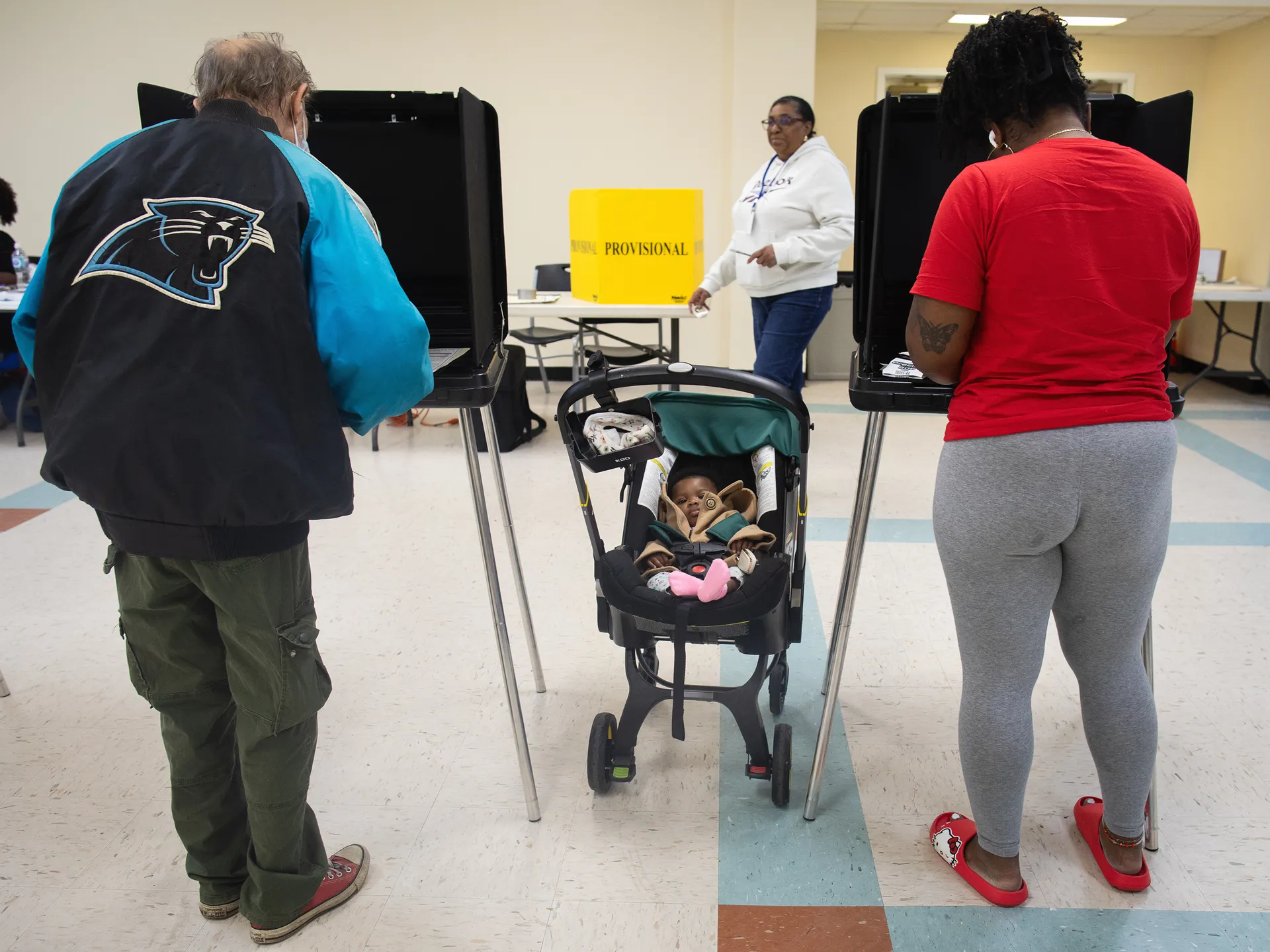 Photo essay: Amid historic election, Virginians long for change 22 Cyra Jenkins, 5 months, waits patiently as his mom, Charese Jenkins, votes. Ms. Jenkins works for the Virginia Department of Juvenile Justice and was very circumspect in her comments because of her position.
