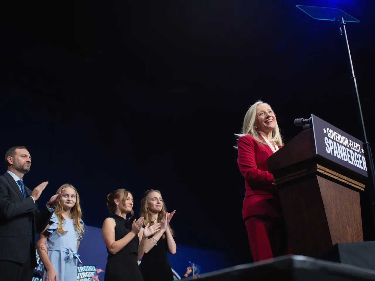 Photo essay: Amid historic election, Virginians long for change 8 Virginia Gov.-elect Abigail Spanberger takes the stage with her family during the election night event that ultimately celebrates her historic victory on Nov. 4, 2025.