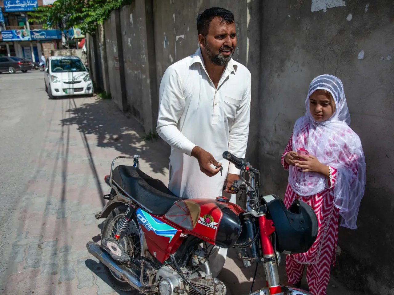 A first-time HPV vaccination campaign sees some success -- and strong resistance 3 Adil Hussain, 36, brought his daughter Ayesha, who's 10, to an HPV vaccination site in Bhara Kahu in Islamabad, Pakistan. Unlike some parents, he responded positively to the vaccine campaign.