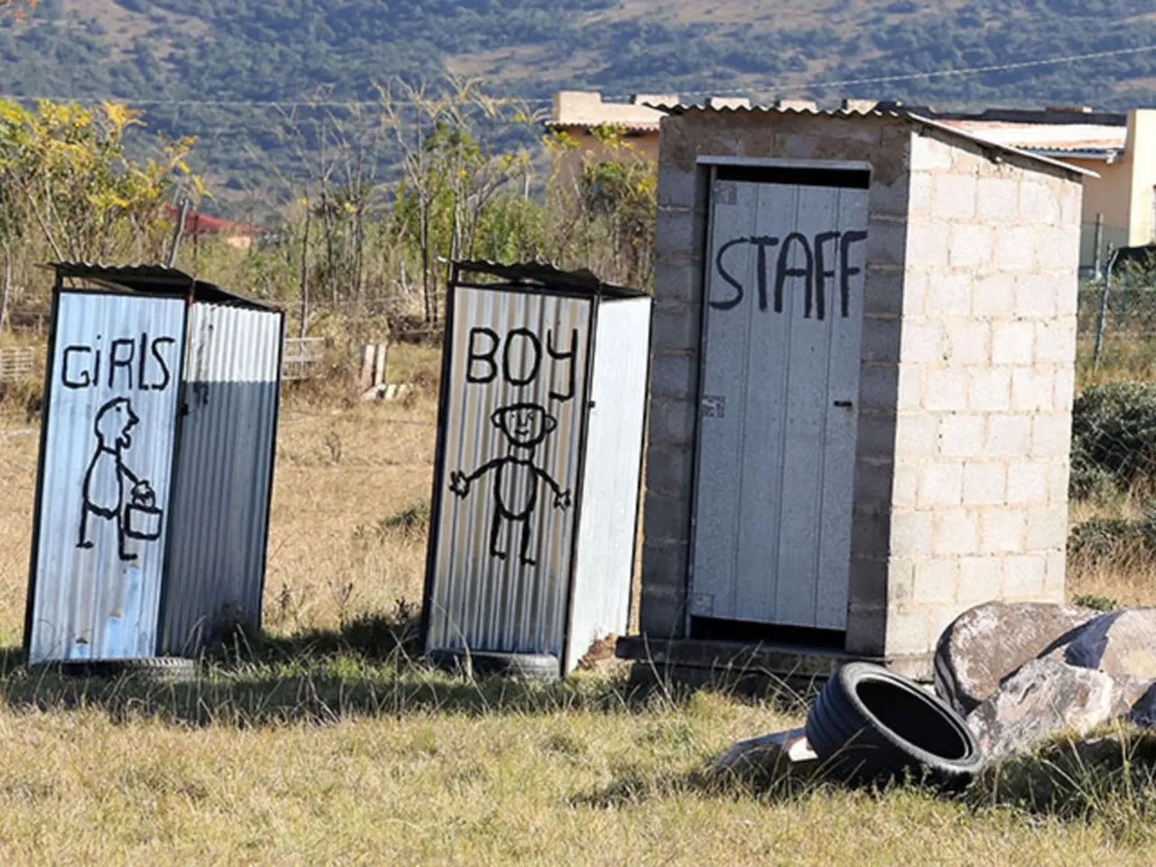 World Toilet Day is today! Um ... is that really the best name? 1 Makeshift toilets are a common scene along the roads of South Africa's Eastern Cape, like this set at a school in Mathanga village.