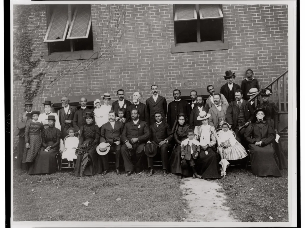 'Reflections in Black' celebrates history of Black photography with expanded issue 4 Members of the First Congregational Church in Atlanta pose outside the church in this photograph by Thomas E. Askew. The image appears in W.E.B. Du Bois' albums of photographs of African Americans in Georgia exhibited at the 1900 Paris Exposition Universelle, and is included in Reflections in Black.