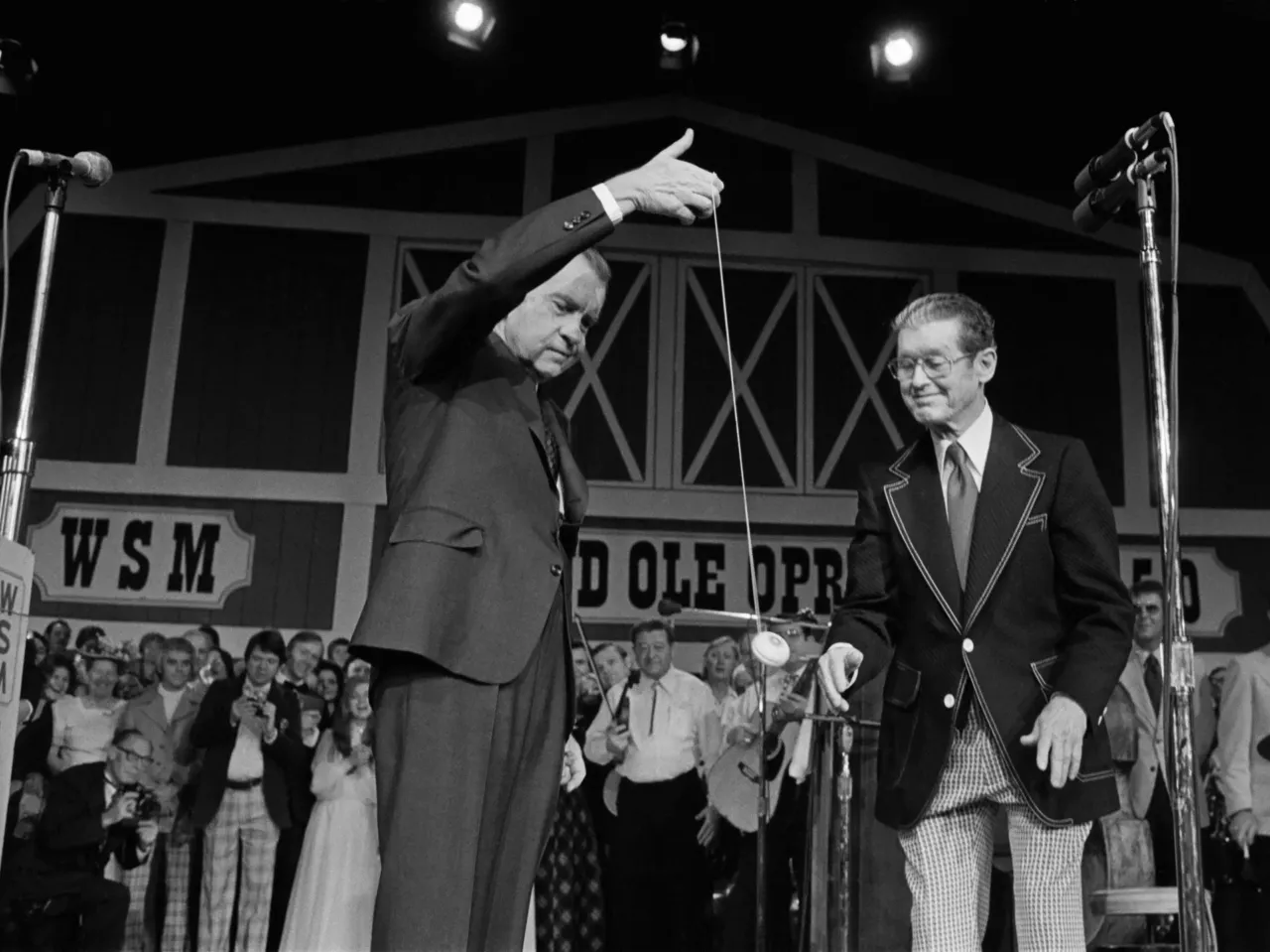 President Richard Nixon with Roy Acuff at the dedication of the Grand Ole Opry House in Nashville, Tenn. on March 16, 1974. In addition to demonstrating his yo-yo skills, Nixon also played songs on the piano.