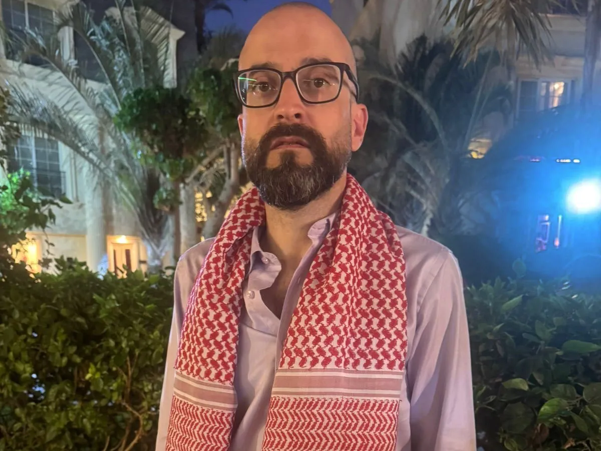 Bassem Khandaqji, 41, poses for a photo at a hotel in Cairo on Oct. 17, 2025, days after Israel freed him and other Palestinian prisoners in the Gaza ceasefire deal. He was imprisoned for helping plan a deadly 2004 bombing in Tel Aviv, and went on to become an award-winning novelist in prison.