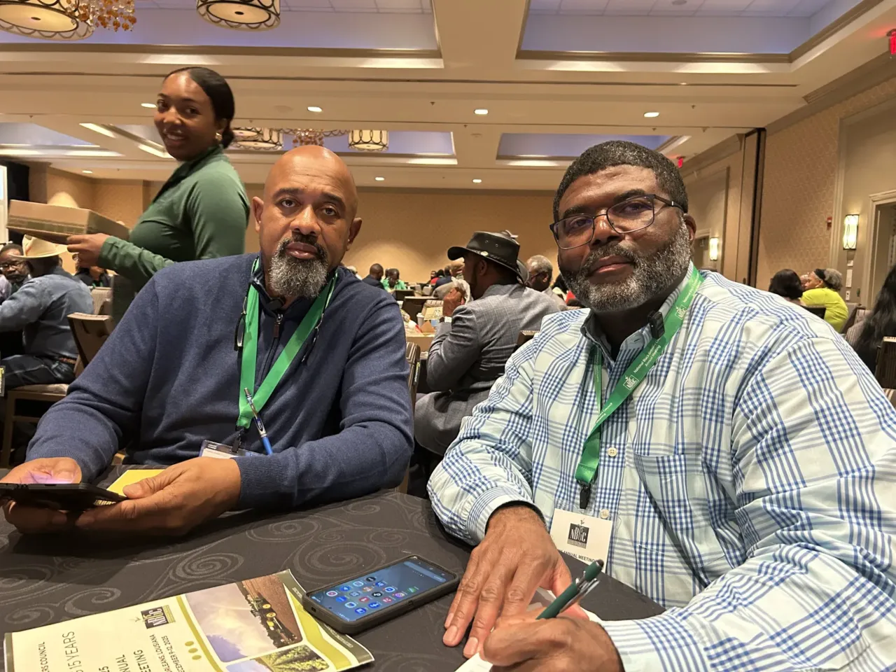 With federal relief on the horizon, Black farmers worry it won't come soon enough 2 Finis Stribling III (left) and John Green II (right) take a break during the National Black Growers Council conference in New Orleans on Dec. 10, 2025. Both Stribling and Green were plagued by bad weather at the start of this year's growing season, and both said tariffs have only made things harder.