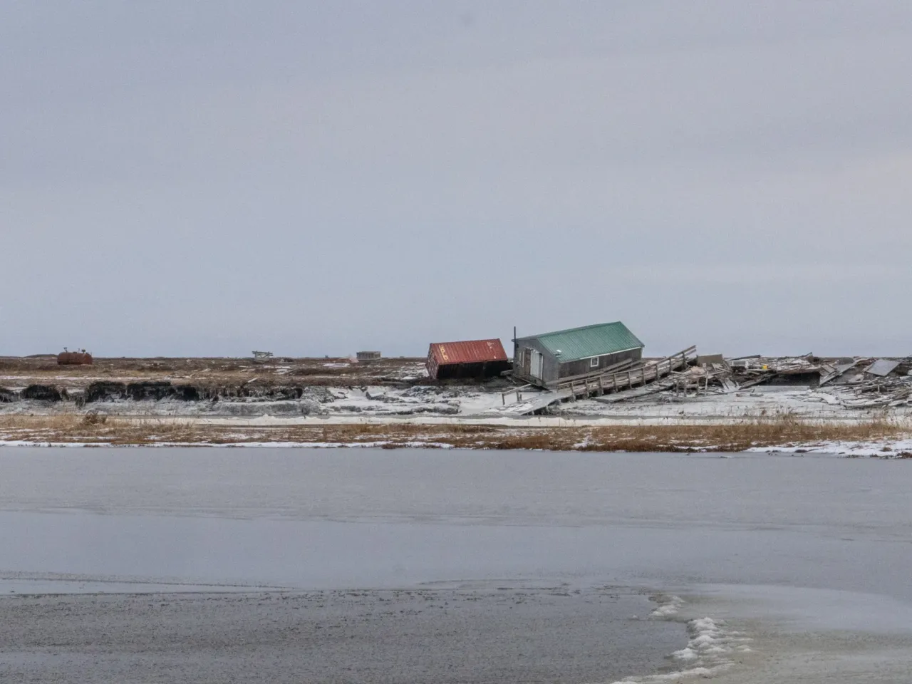 Houses floated away in this Alaska Native village. Now residents want to move 6 Homes across the Kwigillingok River are inaccessible by ATV until the river freezes. Many homes floated far from their original locations due to the flooding from the remnants of Typhoon Halong.