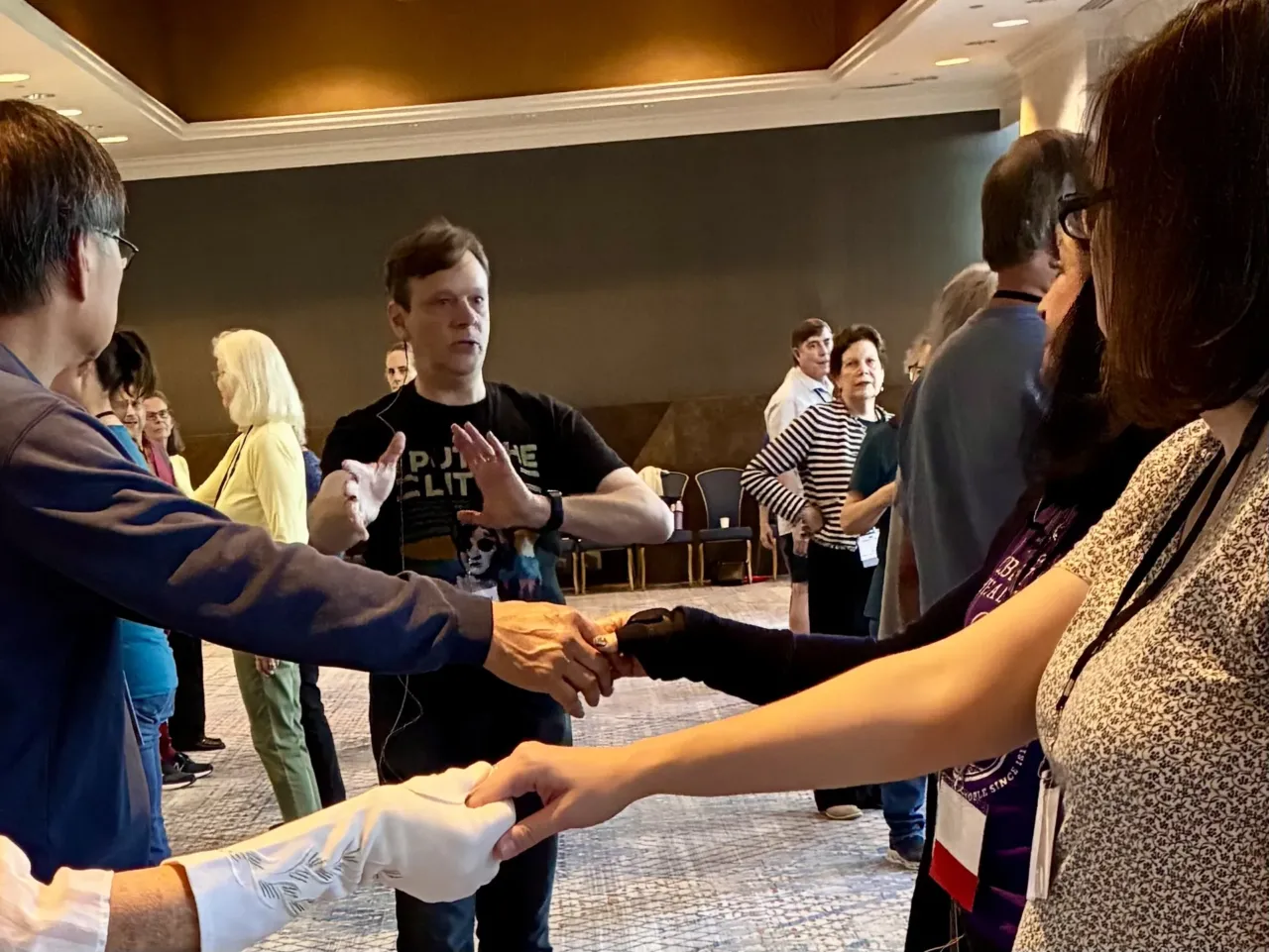 All about character: Jane Austen fans on their favorites 5 Tom Tumbusch explains 19th century dance moves to JASNA members.