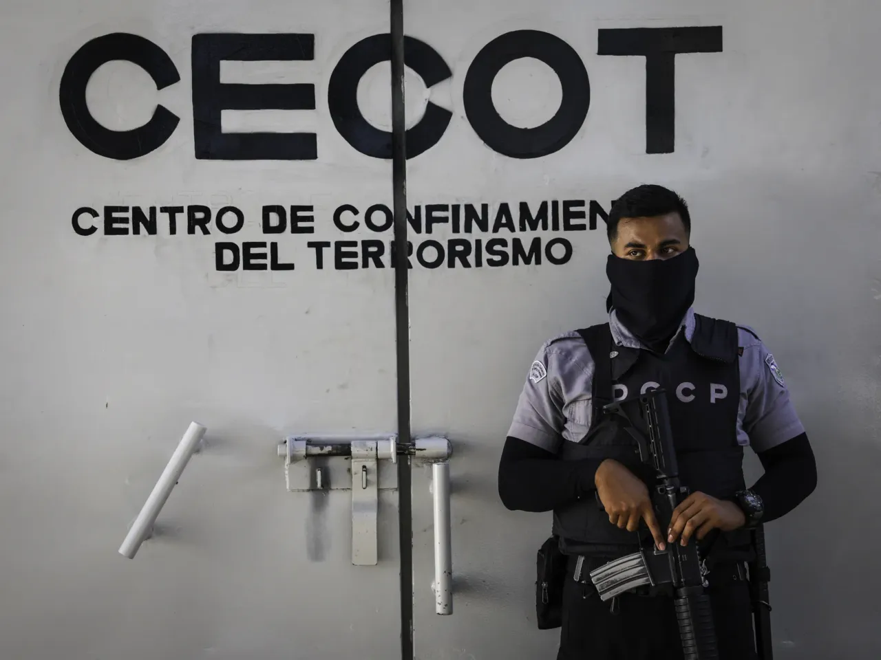 A prison guard mans an interior perimeter at the CECOT (Counter Terrorism Confinement Center) on Dec.15, 2025 in Tecoluca, El Salvador. CECOT gained notoriety in 2025 when the Trump administration began its controversial policy of deporting people to El Salvador who they claimed were members of the Venezuelan gang Tren De Aragua.