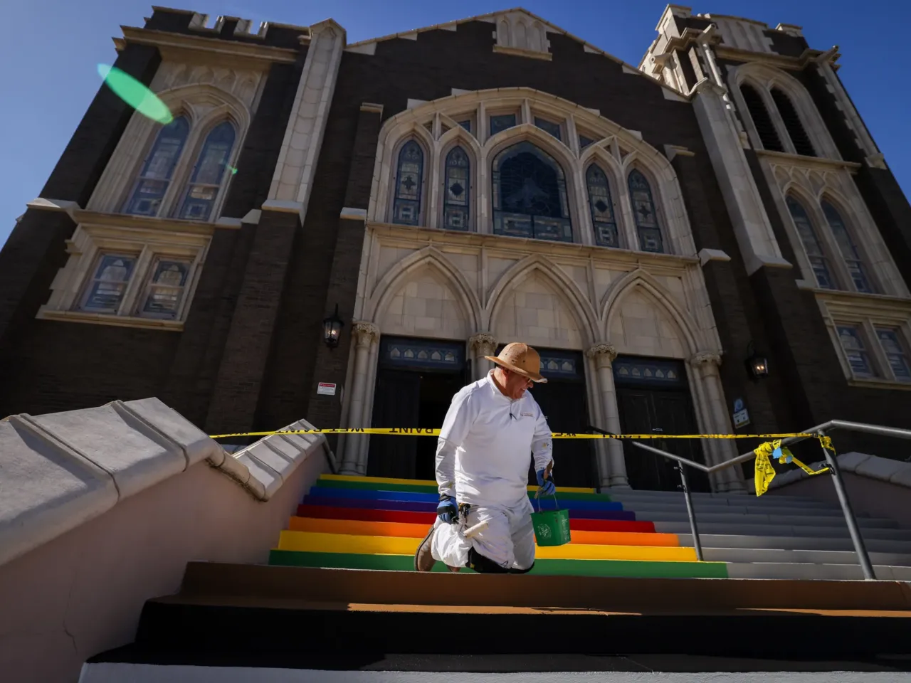 2025: The images that stayed with us 4 Robert Garcia paints the stairs of Oak Lawn United Methodist Church in Pride and trans colors Wednesday, Oct. 22, 2025, in Dallas, Texas. The church made the move in response to Texas Gov. Greg Abbott's order to remove symbols from crosswalks in cities across the state.