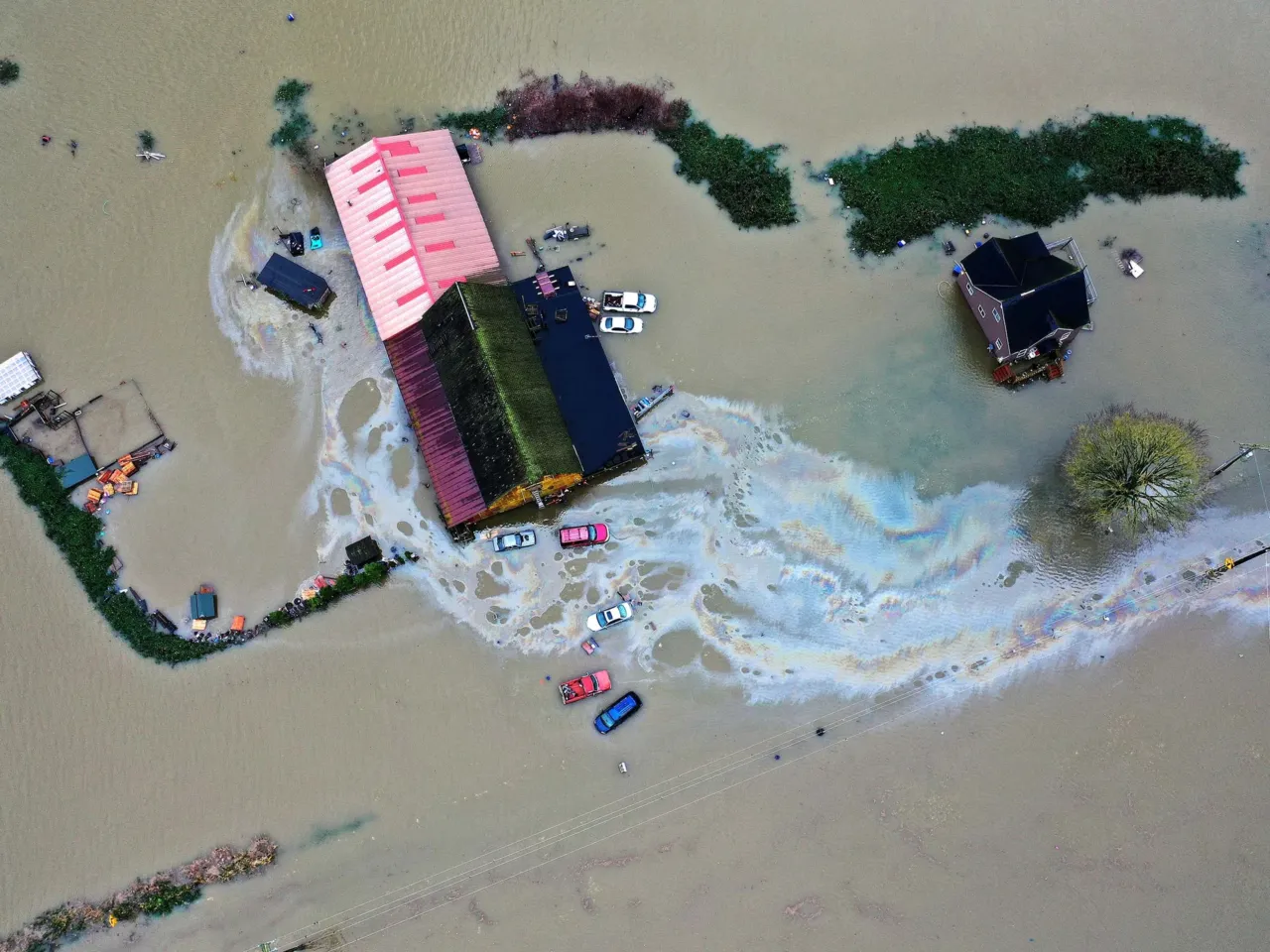 2025: The images that stayed with us 16 Homes near Mount Vernon, Wash., are shown surrounded by floodwaters following consecutive atmospheric rivers on Dec. 11.