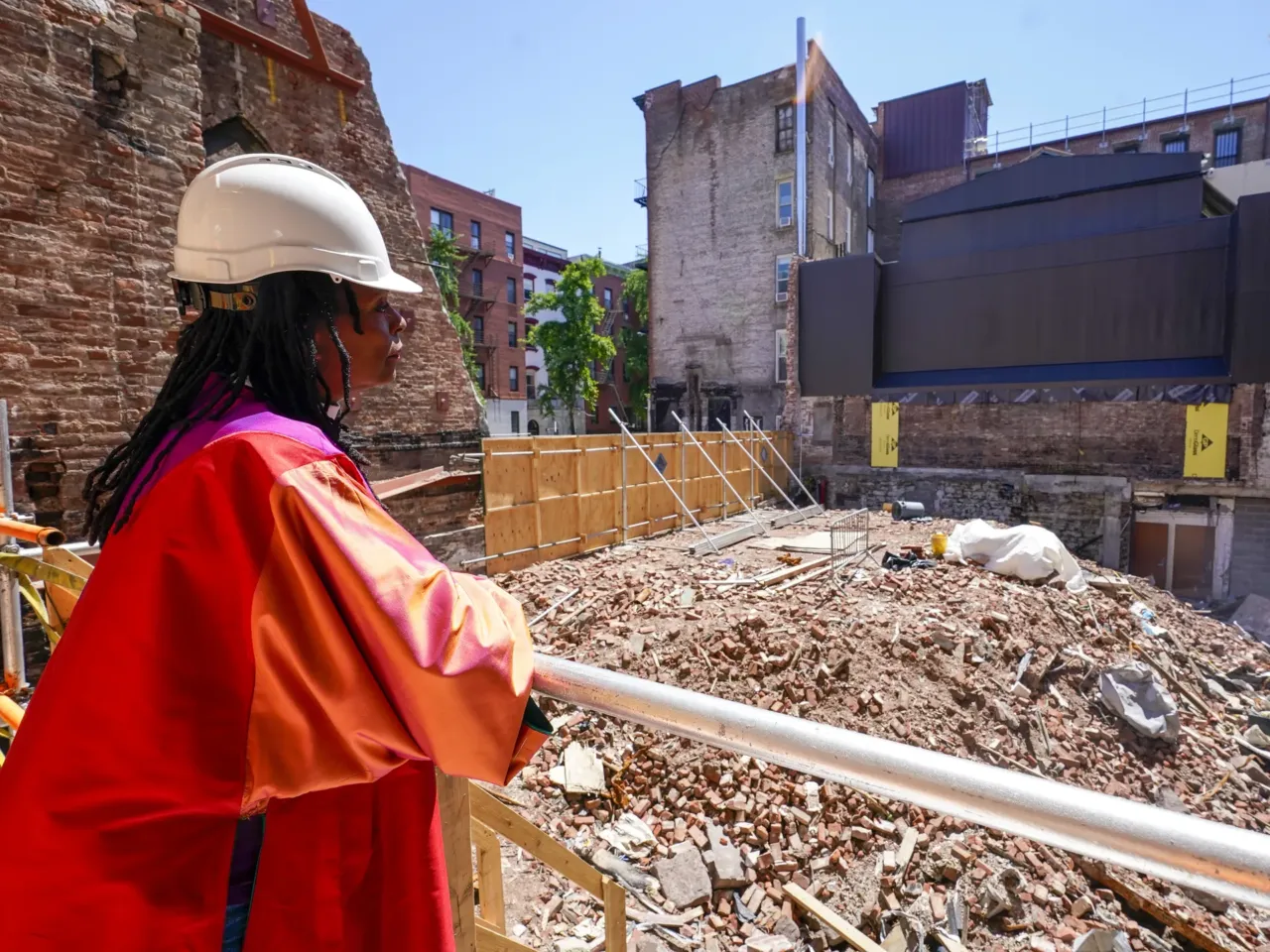 Senior Pastor Rev. Jacqueline J. Lewis poses overlooking the rubble of Middle Collegiate Church in New York's East Village on June 16, 2021, after the historic building was destroyed by a six-alarm fire in December 2020. Lewis recently spoke with NPR's Morning Edition about marking Christmas this year with the church's first in-person Christmas Eve service since the fire,