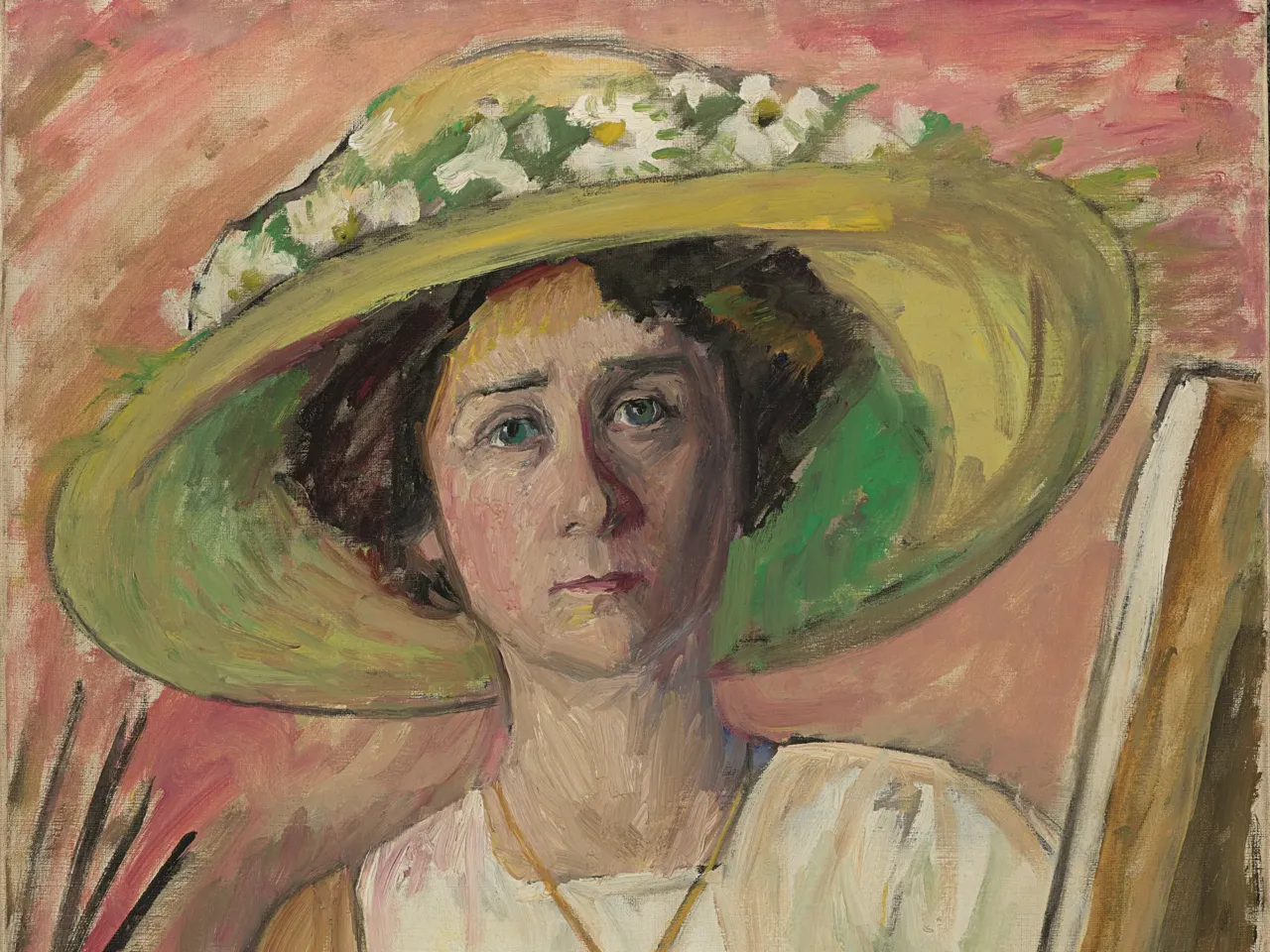 Gabriele Münter's Self-Portrait in Front of an Easel (Selbstbildnis vor der Staffelei), circa 1908-1909. Oil on canvas. (© 2025 Artists Rights Society (ARS), New York/VG Bild-Kunst, Bonn)