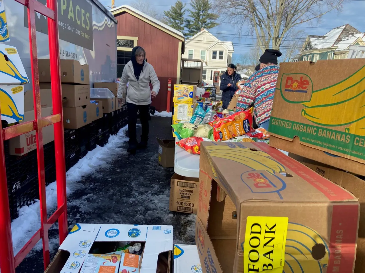 In the U.S., hunger is often hidden. But it can still leave scars on body and mind 4 Ramona Kallem, a volunteer, helps distribute food at the twice-a-week food bank outside the Easthampton Community Center.