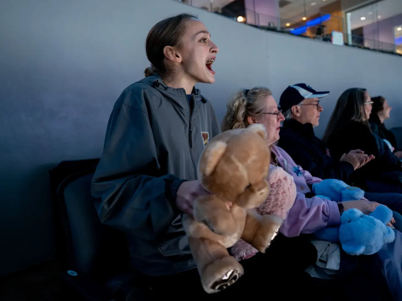 Alyse Ralph, 13, of Ann Arbor, Mich., cheers on Eva Pate and her skating coach Logan Bye as they compete in the ice dance competition during the 2026 U.S. Figure Skating Championships at the Enterprise Center on Thursday, Jan. 8, 2026, in St. Louis.