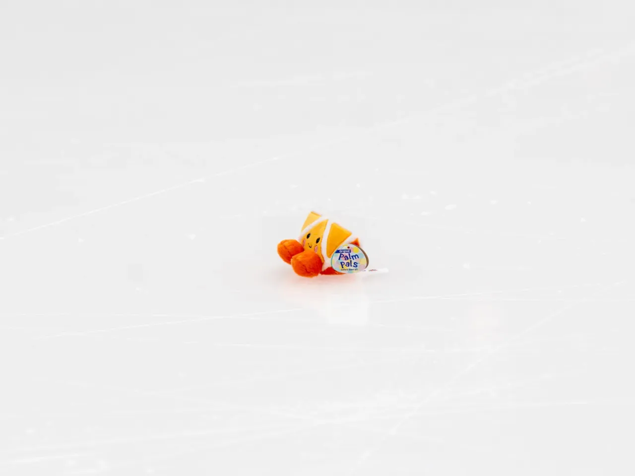 A stuffed orange sits on the ice following a women's short program performance during the 2026 U.S. Figure Skating Championships at the Enterprise Center on Wednesday, Jan. 7, 2026, in St. Louis.