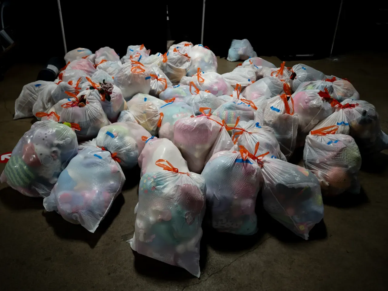 Several pounds of stuffed animals collected from figure skating fans are packed ready to be donated to local charities after the 2026 U.S. Figure Skating Championships on Saturday, Jan. 10, 2026, at the Enterprise Center in St. Louis.