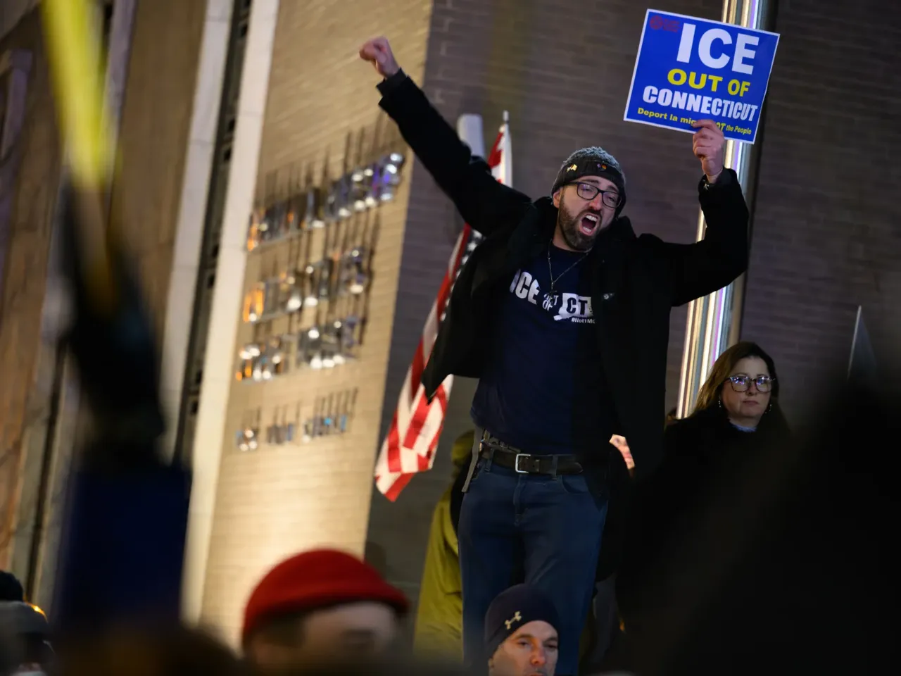 Protesters gather outside the Abraham A. Ribicoff Federal Building and U.S. Courthouse in Hartford, Conn. on January 8, 2026. Hundreds gathered around the building for a vigil and protest against the killing of Renee Macklin Good by an ICE agent in Minneapolis.