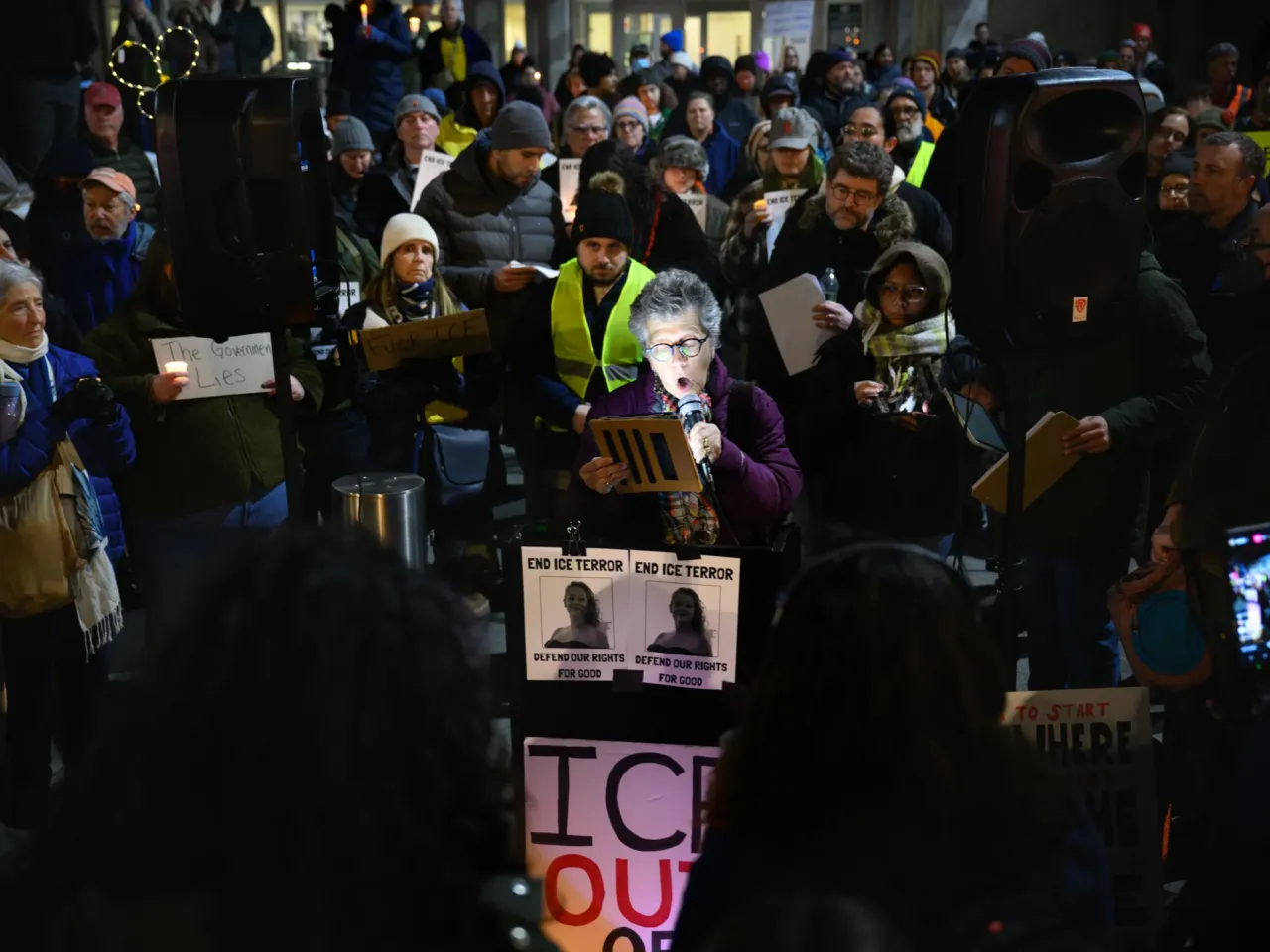 Protesters gather around Rosario Caicedo, a Colombian immigrant and member of the Middlesex Immigrant Rights Alliance. Hundreds protested outside Hartford's Abraham A. Ribicoff Federal Building and U.S. Courthouse, on Jan. 8, 2026.