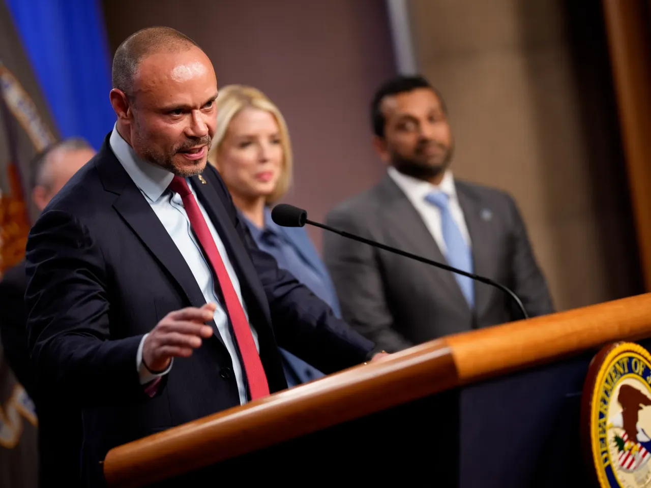 Former FBI Deputy Director Dan Bongino confirming the arrest of a suspect in the Jan. 6 pipe bomb case at the Department of Justice in 2025.