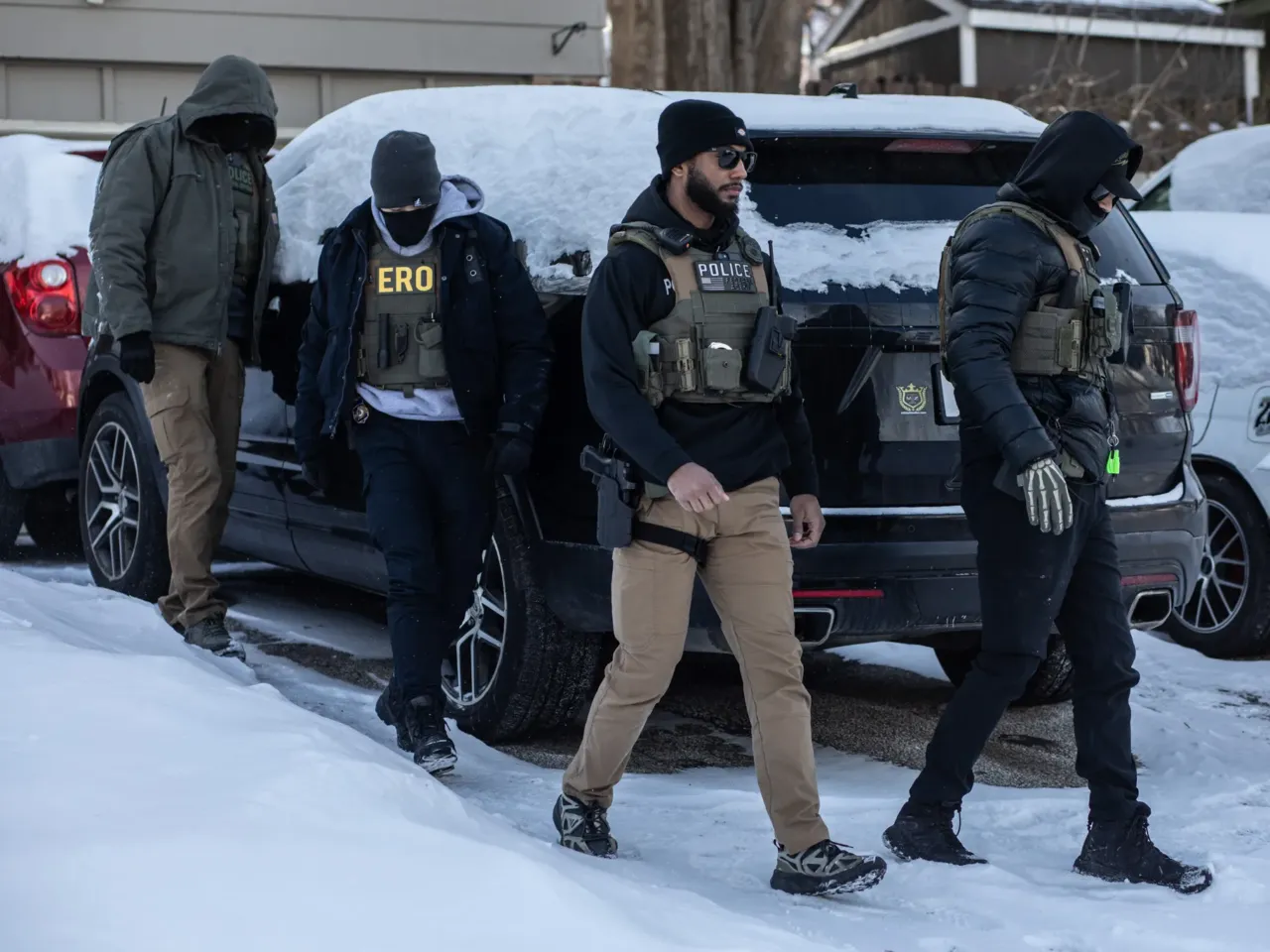 How an errand for a 12-year-old immigrant in Minneapolis became an underground operation 1 Ice agents outside a home in Minneapolis, Minnesota, Jan. 19, 2026.