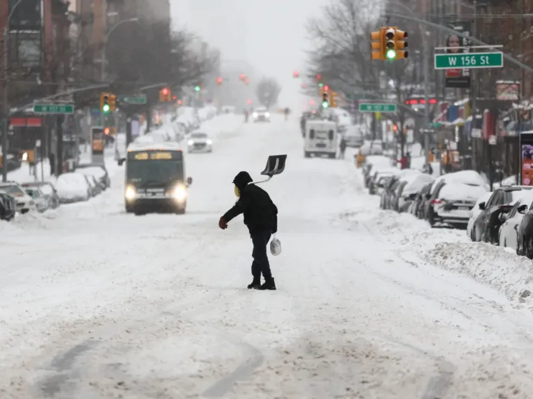 Power outages and canceled flights as winter storm brings snow, sleet and ice