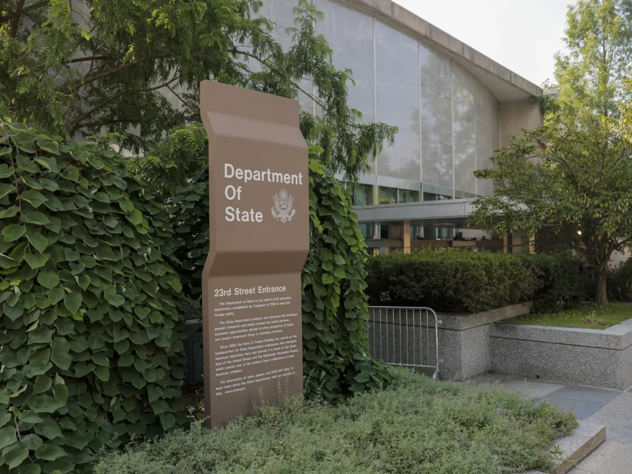 A sign for the U.S. Department of State is seen on the outside of the Harry S. Truman Federal Building on on July 11, 2025 in Washington, DC.