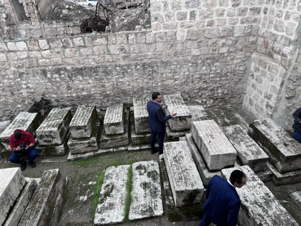 Syria, once home to a large Jewish community, takes steps to return property to Jews 2 Henry Hamra (R) examines centuries old tombstones of rabbis buried at Aleppo's main synagogue. For hundreds of years, the synagogue held the oldest known surviving manuscript of the Hebrew bible.