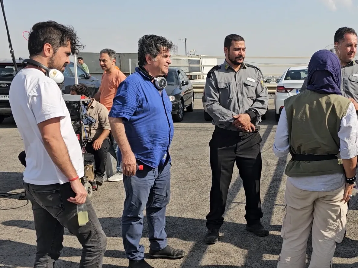 Oscar-nominated director calls Iran a 'failed state' after his co-writer's arrest 1 Jafar Panahi, left in a blue shirt, appears on the set of his Oscar-nominated film It Was Just An Accident.