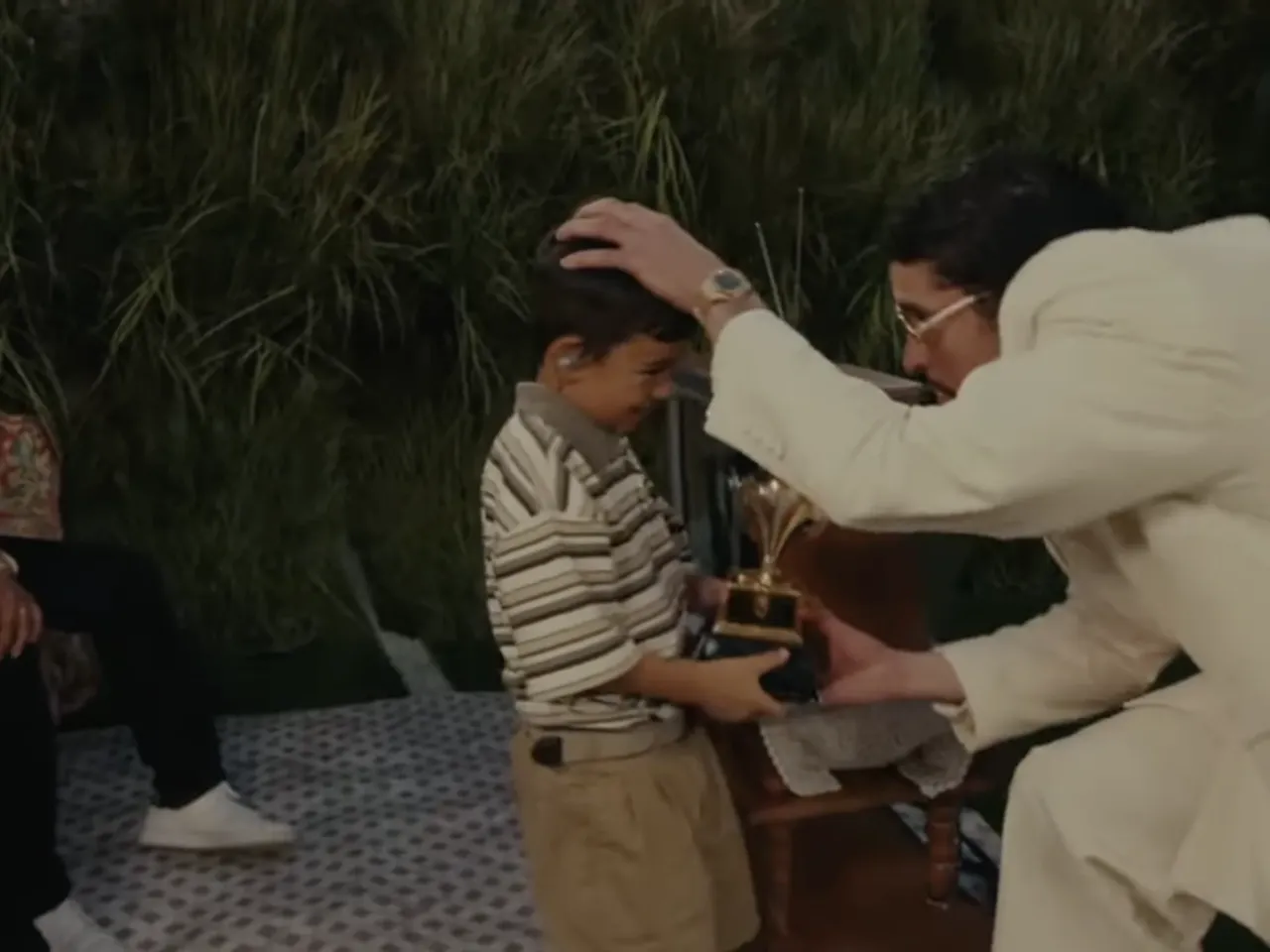 No, that wasn't Liam Conejo Ramos in Bad Bunny's Super Bowl halftime show 1 A screenshot of Bad Bunny giving a Grammy to a young boy during the Super Bowl performance.