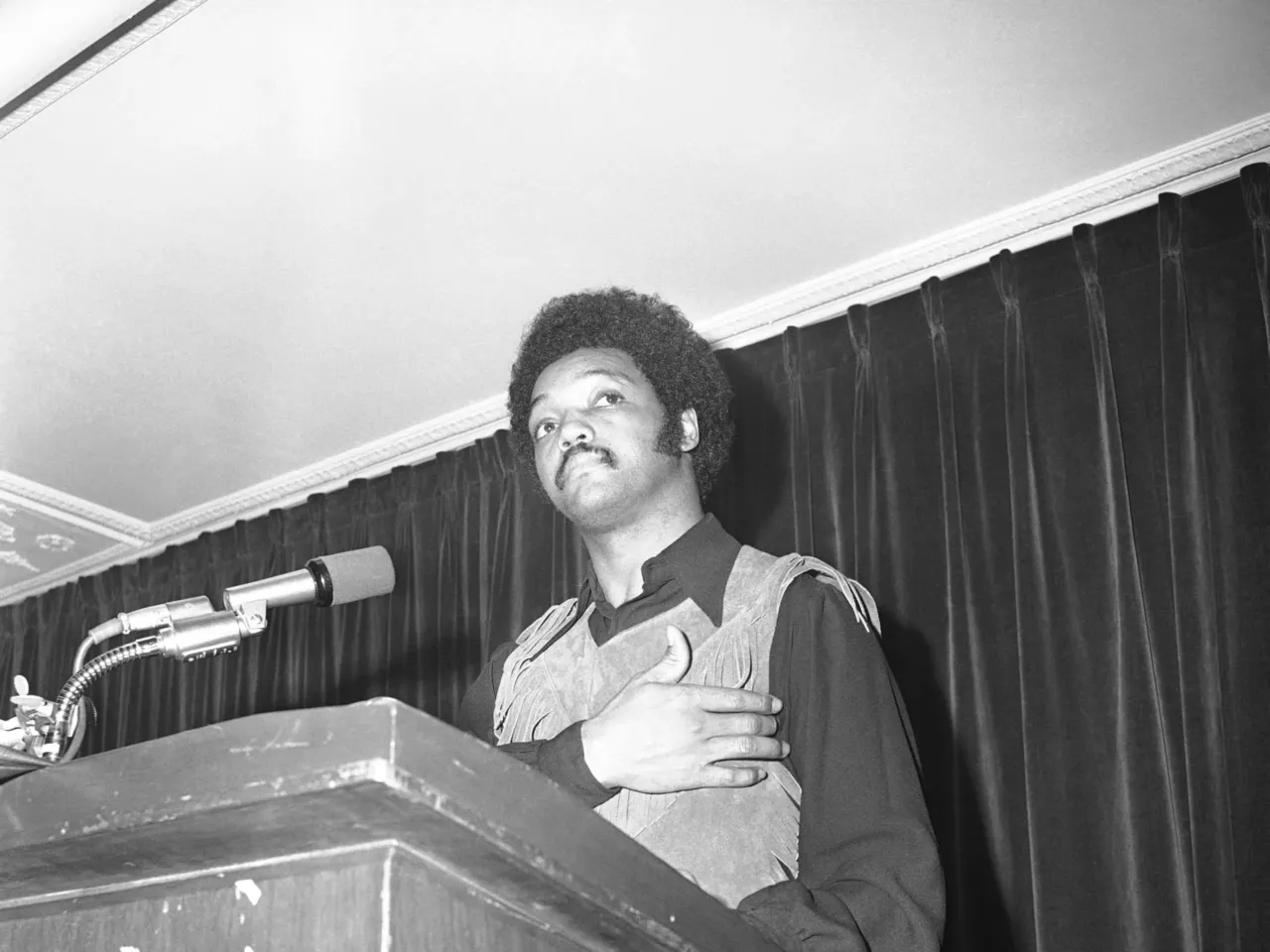 The Rev. Jesse Jackson, head of Southern Christian Leadership Conference's Operation Breadbasket, speaks about a need for economic stability in the nation in Chicago on Feb. 23, 1971.