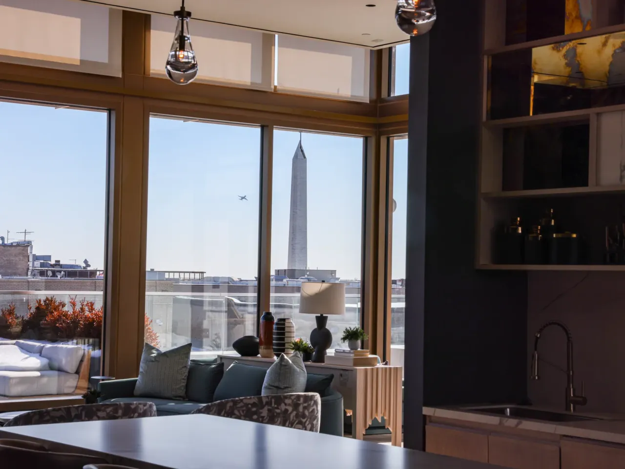 From cubicles to kitchens: How empty offices are becoming homes 4 The Washington Monument is seen from the sky lounge of the rooftop penthouse at Accolade.