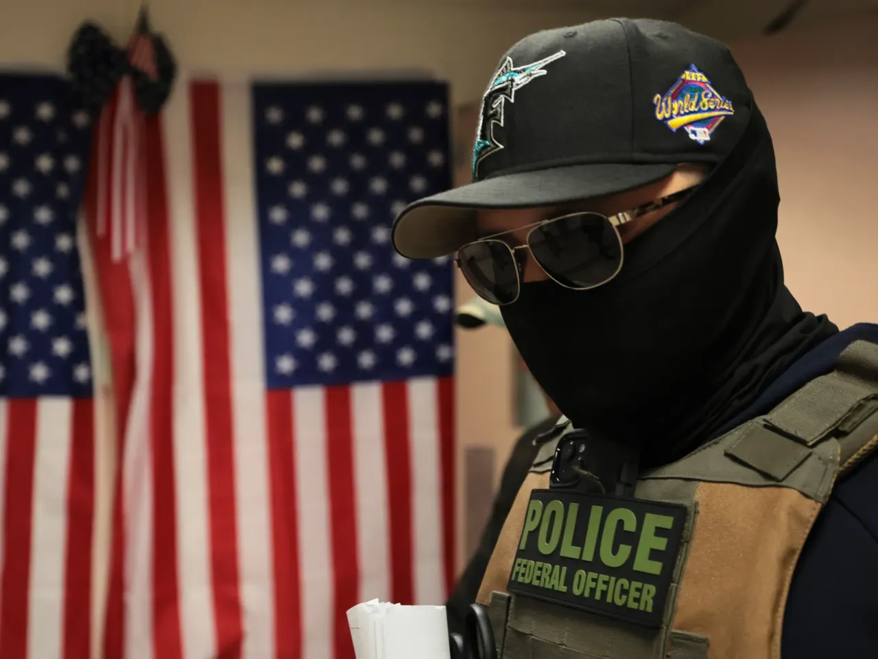 U.S. has a quarter fewer immigration judges than it did a year ago. Here's why 2 Federal agents patrol the halls of immigration court at the Jacob K. Javits Federal Building in July 2025 in New York City.