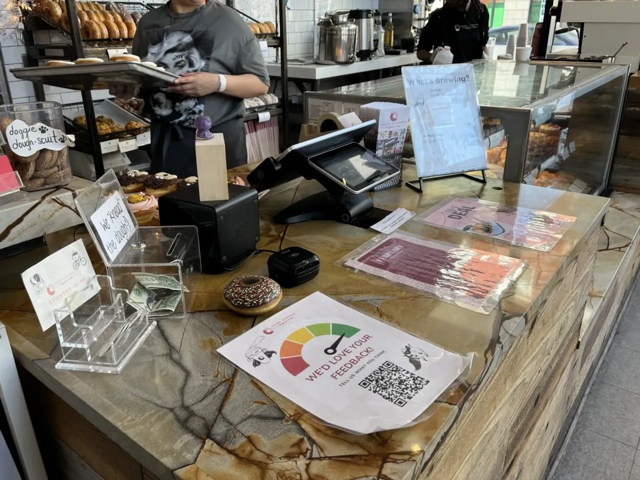 Every business wants your review. What's with the feedback frenzy? 1 A QR code at Good Company Doughnuts in Arlington, Va., invites customers to provide feedback. The store's co-founder says reviews are just part of running a business now.