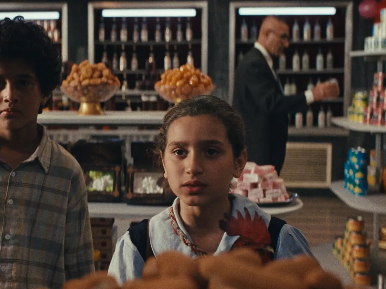 Sajad Mohamad Qasem, seen here at left, plays Lamia's best friend, Saeed.