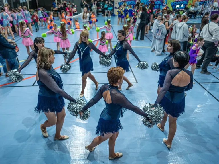 A team of midlife cheerleaders in Ukraine refuses to let war defeat them