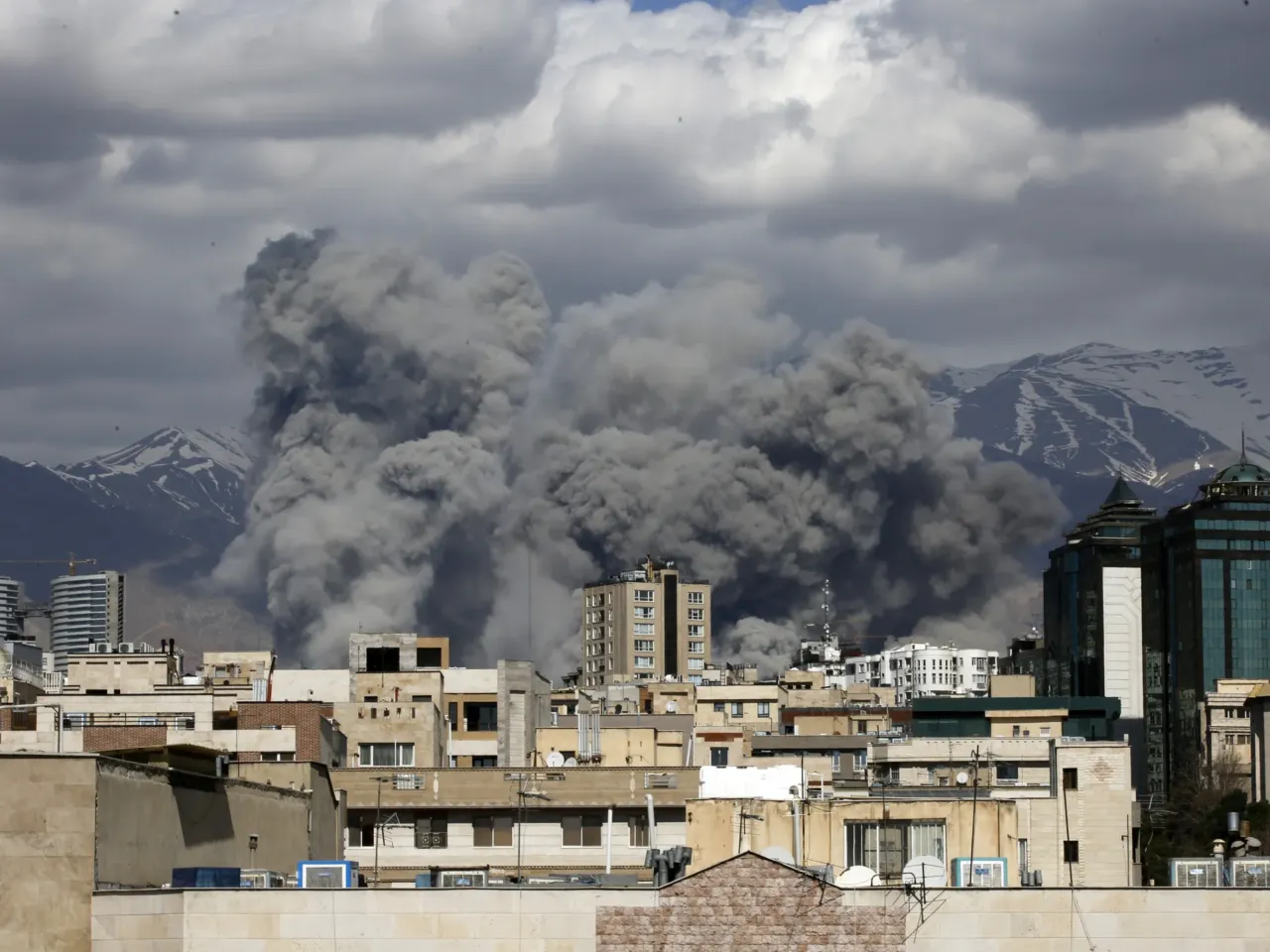 Smoke rises after a series of explosions in Tehran, Iran on March 01, 2026.